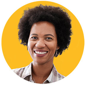 Smiling woman with curly black hair, wearing a light-colored shirt, posed in front of a bright yellow circular background, representing confidence and optimism about her Retirement Savings Plan.